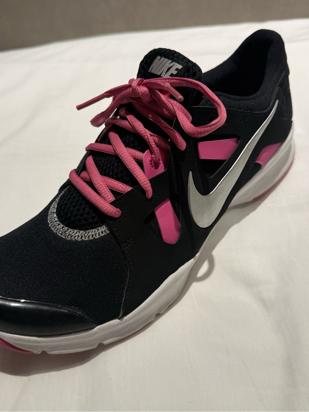 Nike Women’s Black and Pink Training Sneakers with Silver Swoosh